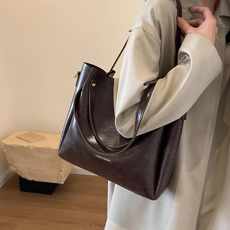 Lange® | Borsa elegante con manici doppi